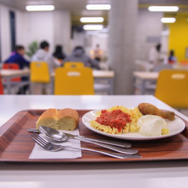 Spaghetti with chicken in tomato sauce in cafe